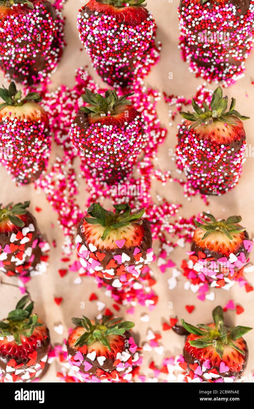 Chocolate dipped strawberries covered with sprinkles Stock Photo Alamy