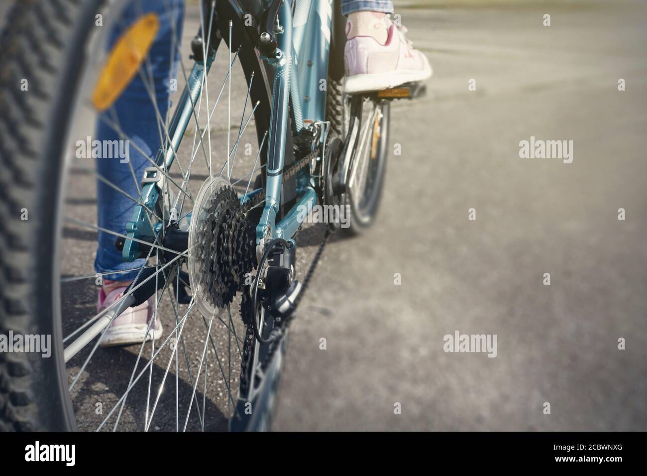 Closeup of a bicycle gears mechanism and chain on the rear wheel of