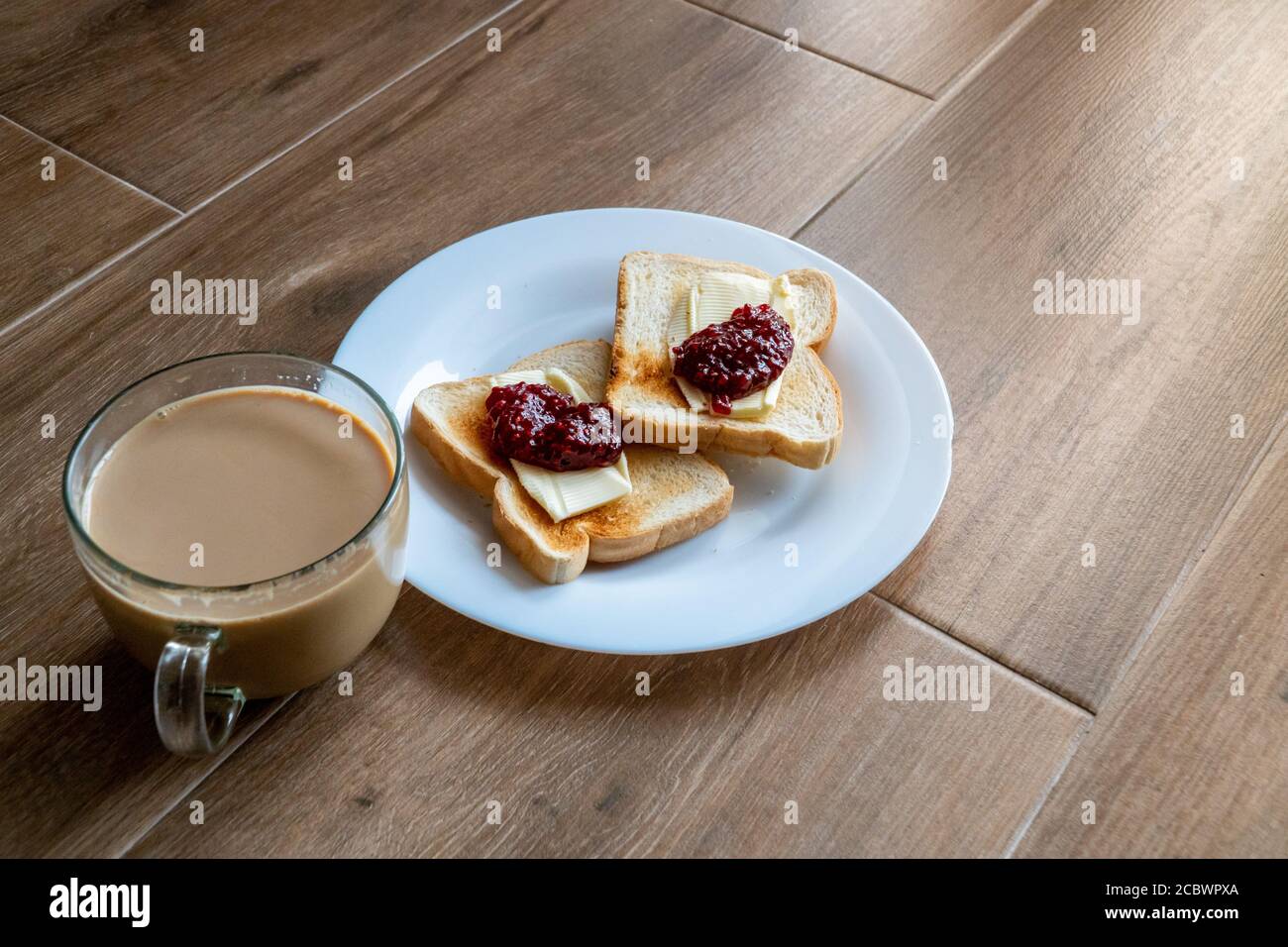 Cup Of Coffe With Milk And Two Slices Of Toasted Sandwich Bread With Butter And Raspberry Breakfast With Coffee Side View Free Space For Text Stock Photo Alamy Cup Of Coffe With Milk And Two Slices Of Toasted Sandwich Bread With Butter And Raspberry Breakfast With Coffee Side View Free Space For Text Stock Photo Alamy