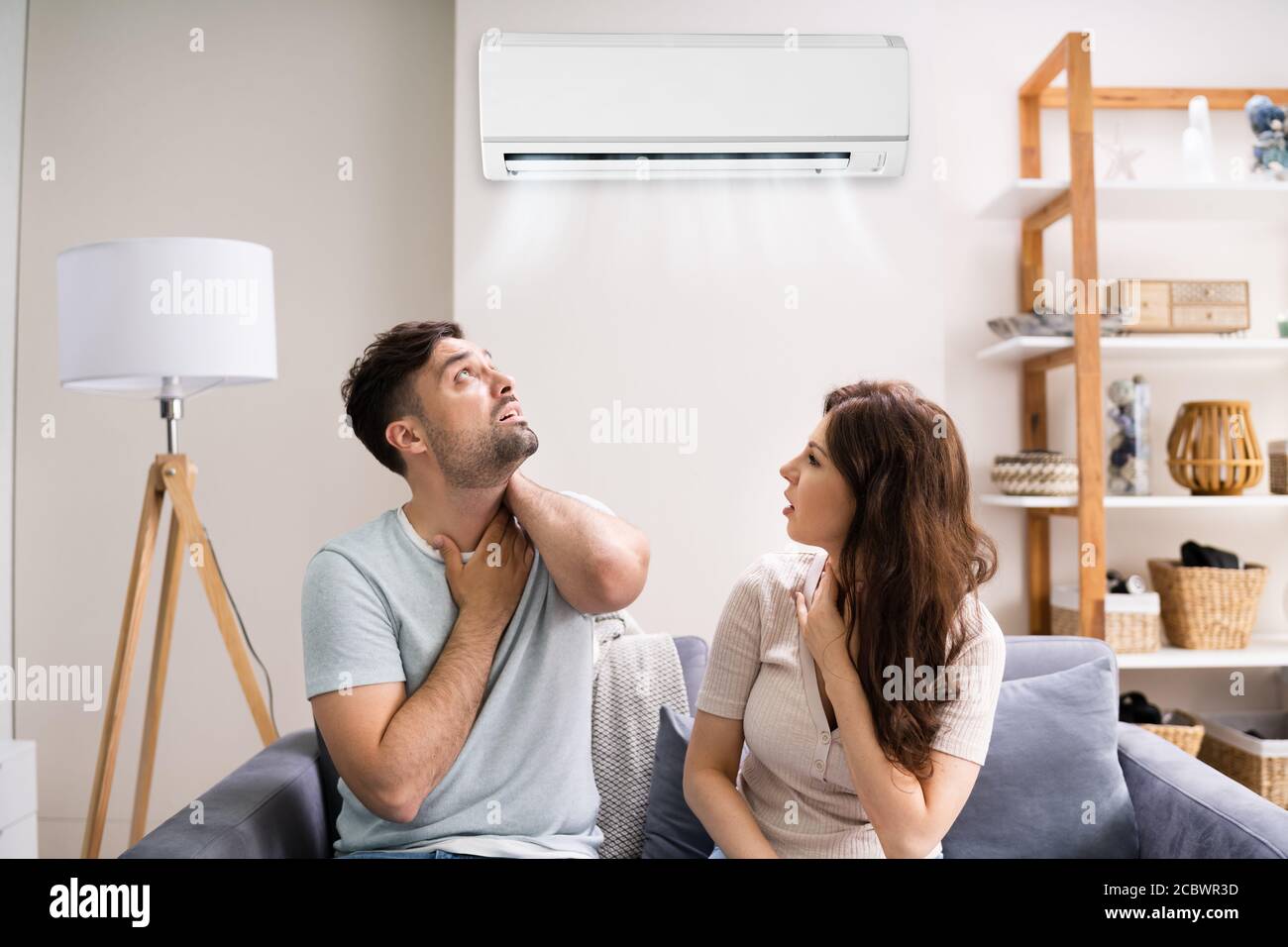 Sick Couple Having Cold And Sore Throat From Air Conditioner Stock