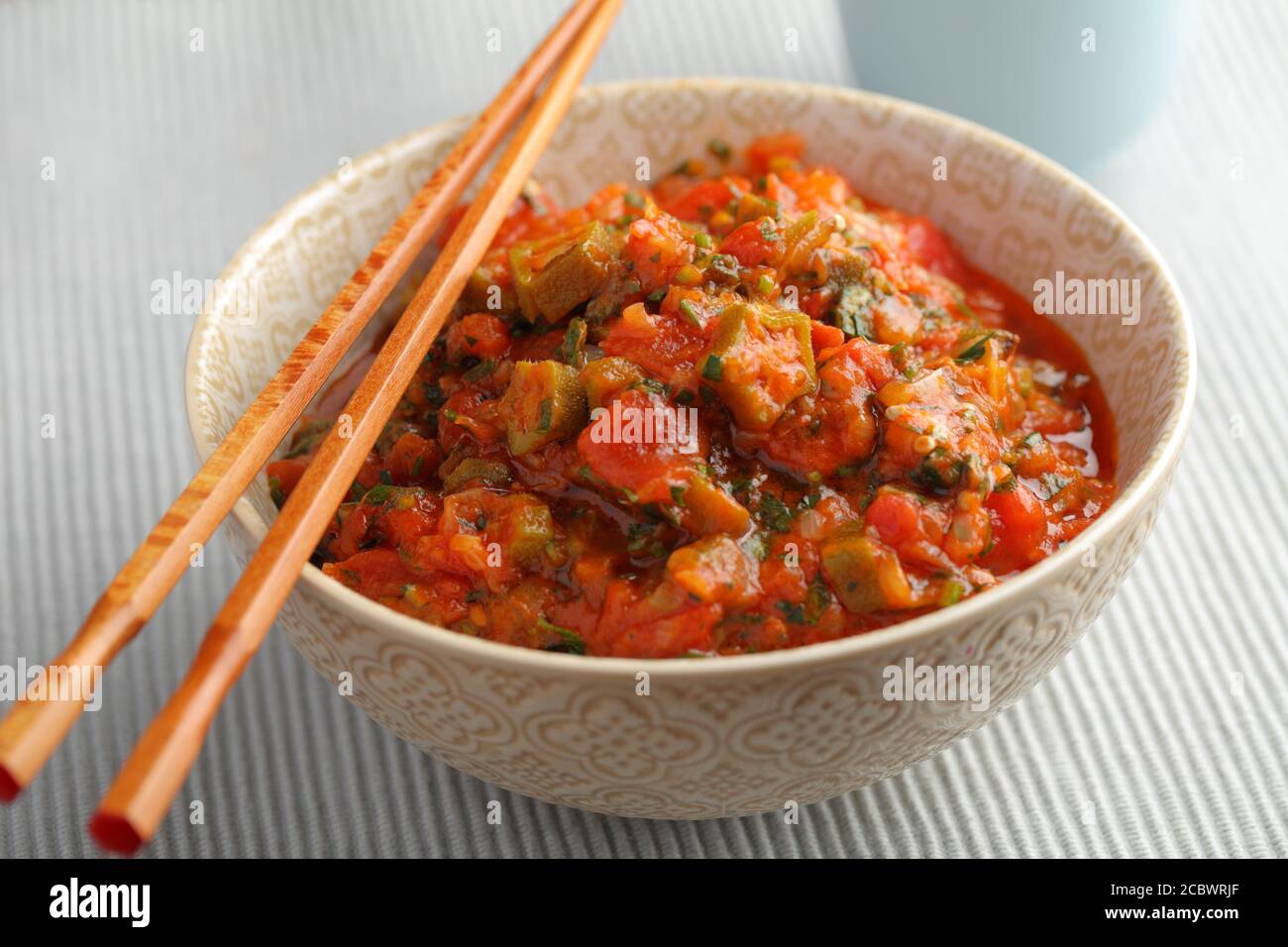 Okra Ragut Asian ragout with okra and tomato Stock Photo - Alamy
