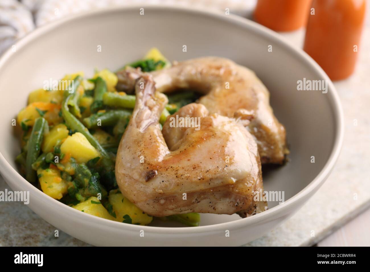 Chicken legs with potatoes and green bean Stock Photo Alamy