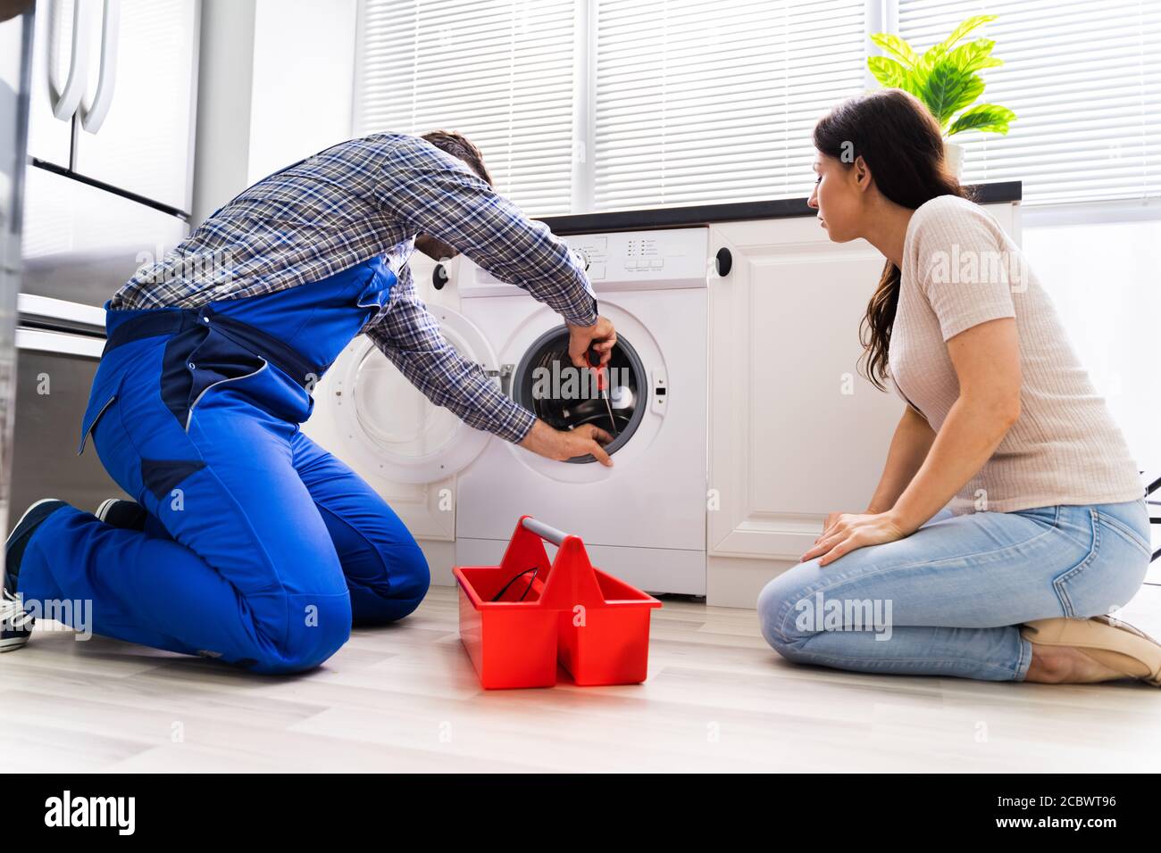 Washing Machine Appliance Problem Repair By Technician Stock Photo - Alamy
