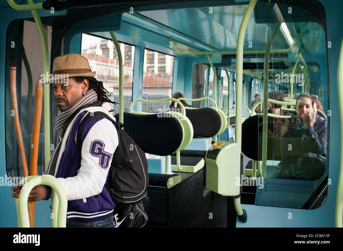 Multiracial black local people inside Montpellier tram. City public transport. Beautiful multi-colored tramway. The Montpellier tramway system has 4 l Stock Photo