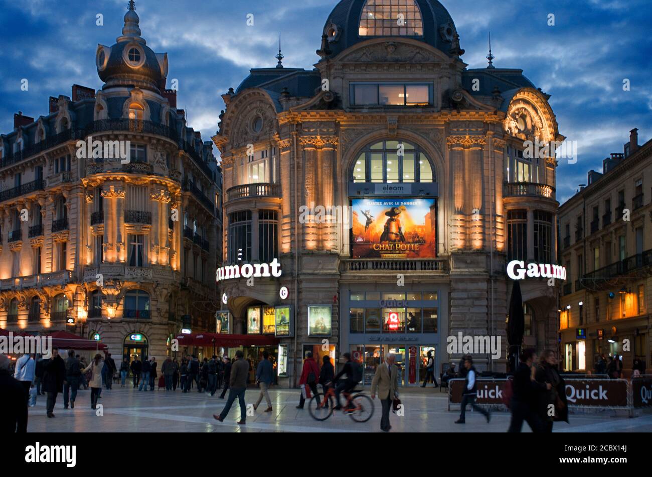 Gaumont Cinema Place de la Comedie Montpellier Languedoc Roussillon France. Bars and restaurants in the Plaza de la Comedia. It constitutes the nerve Stock Photo