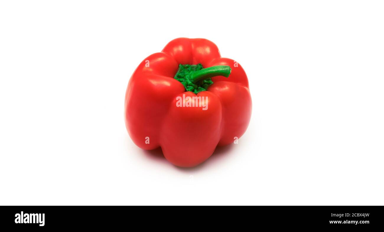 Red bell peppers on a white background Stock Photo - Alamy