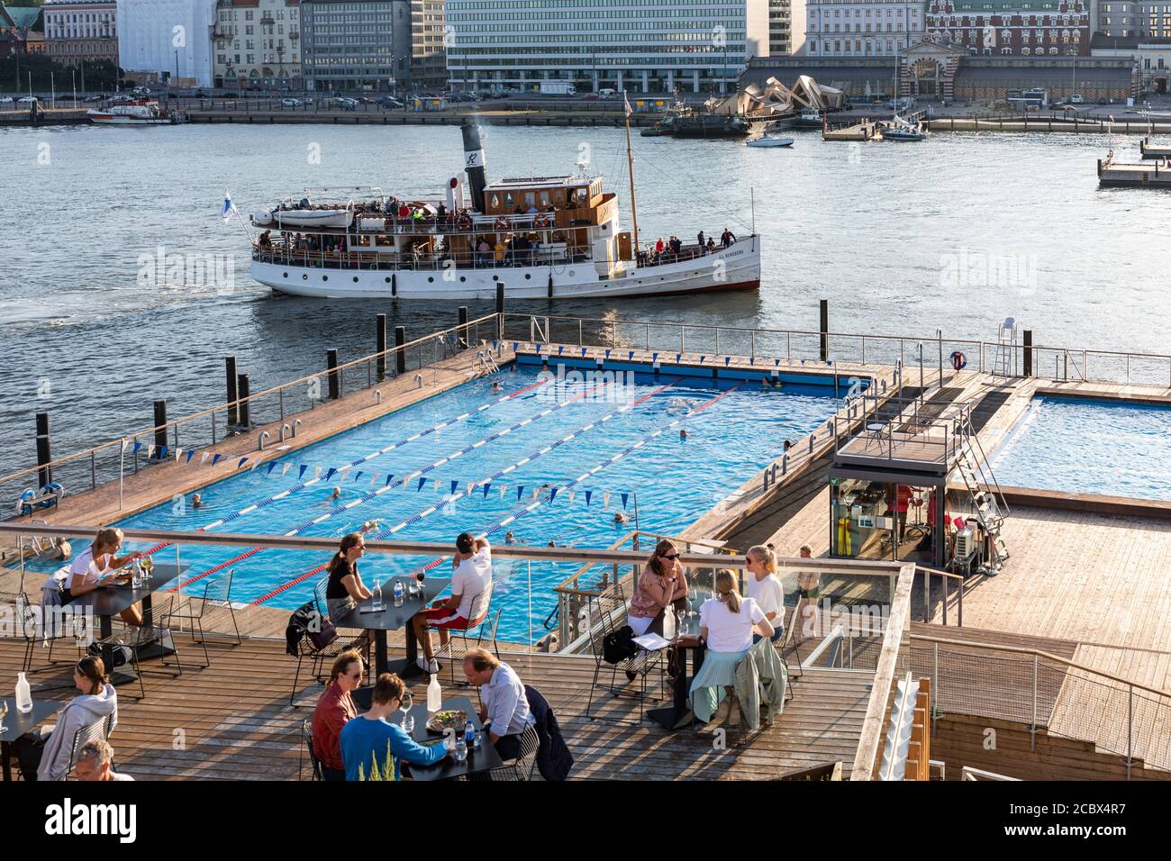 Day trip cruise ship M/S J.L. Runeberg passing Allas Sea Pool in Helsinki, Finland Stock Photo