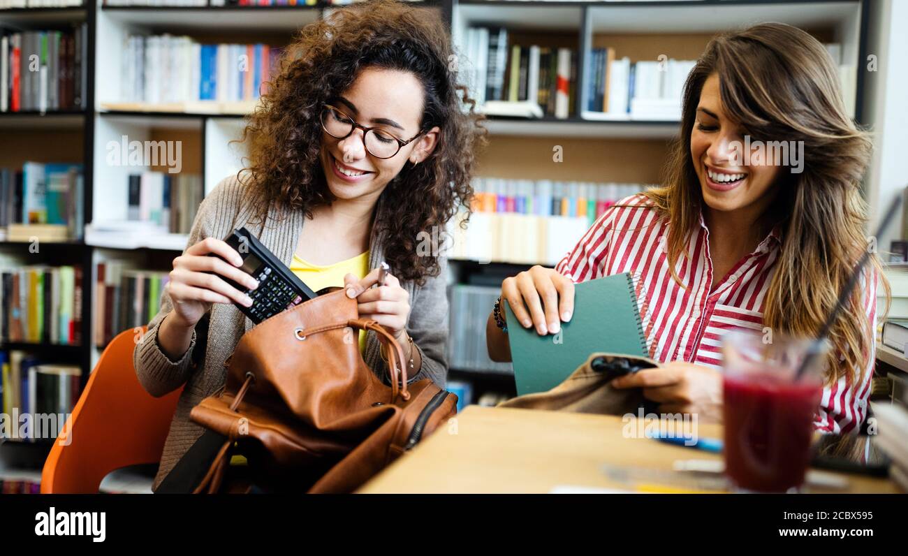 Group of students study at library. Learning and preparing for ...