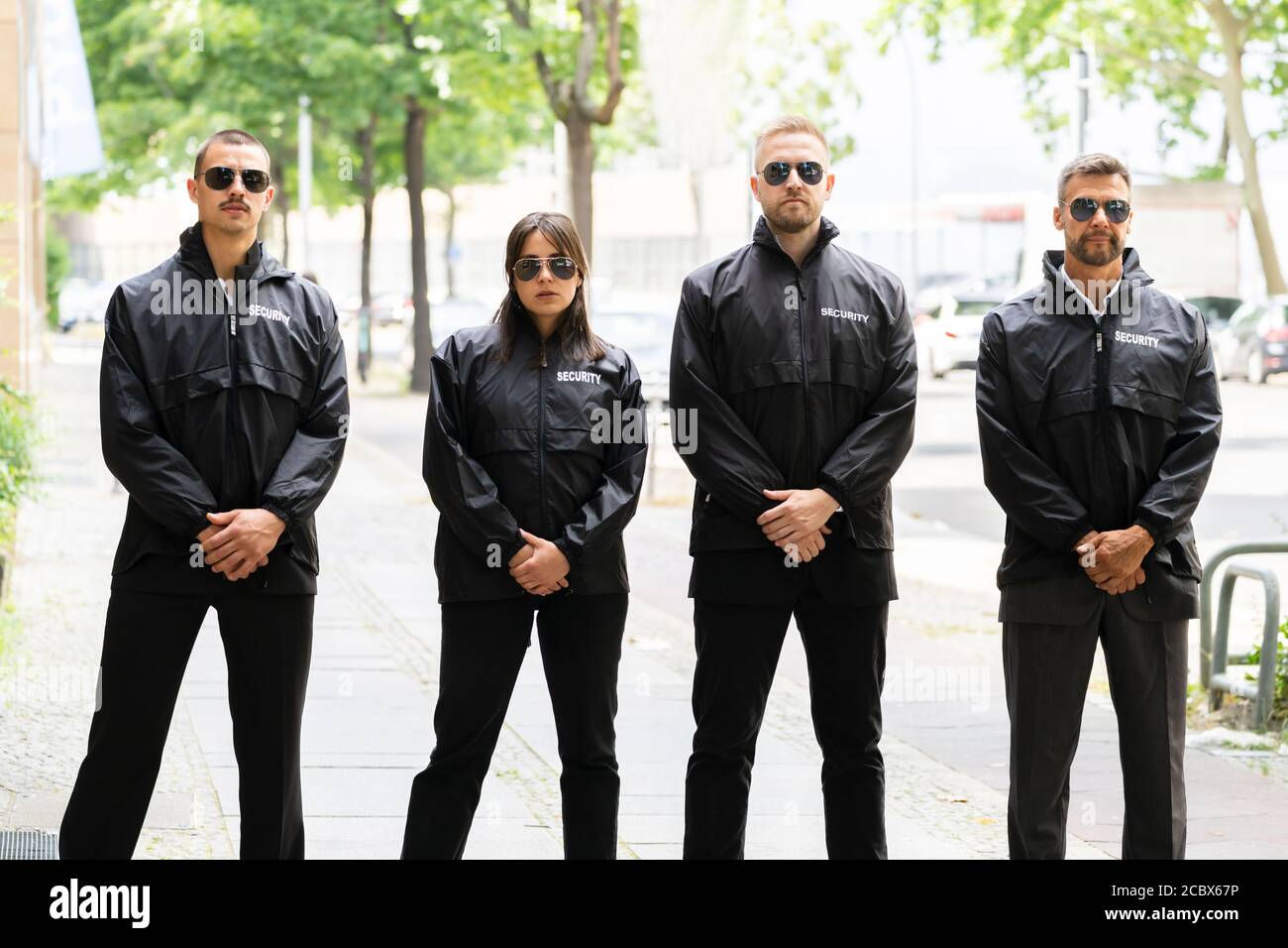 Security Guard Group Event Service. Bodyguard Officer Outside Stock Photo -  Alamy