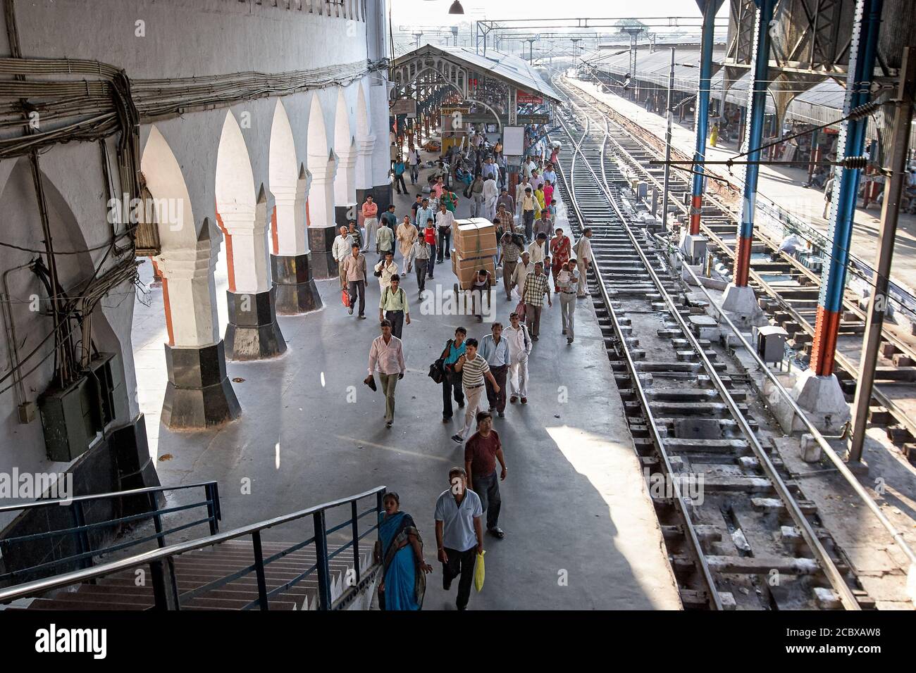 New Delhi/India October 10, 2009 Commuters walk on a platform of New