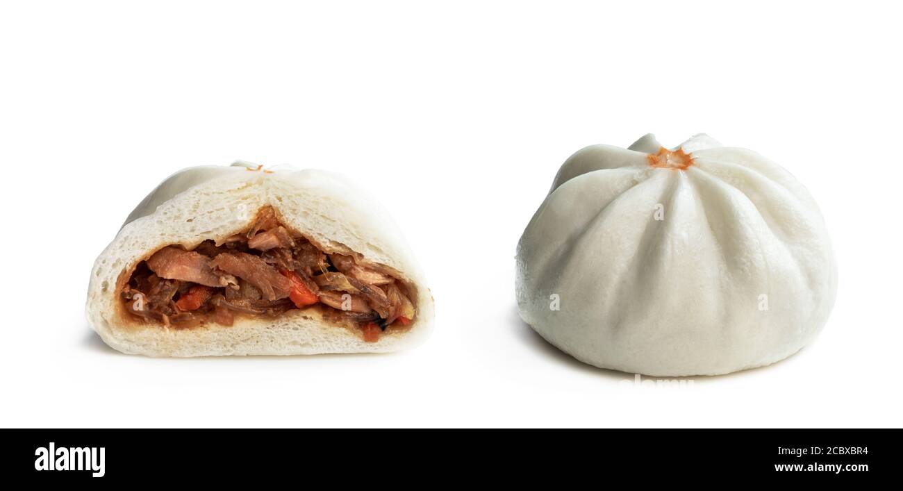 Steamed bao buns with delicious filling isolated on white Stock Photo