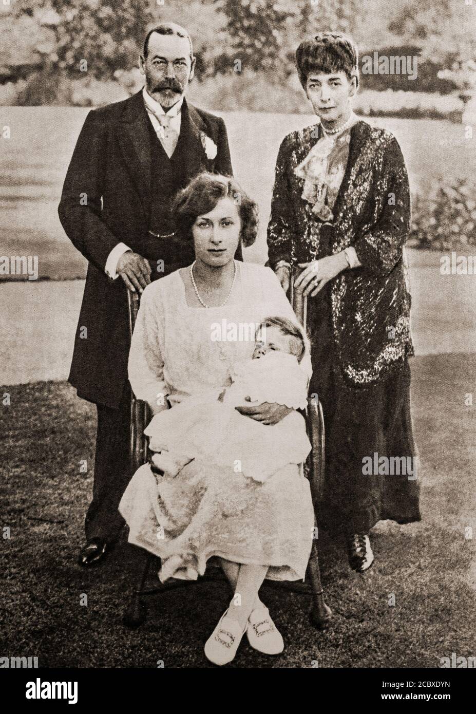 Four generations of Royals in 1923. Queen Alexandra, wife of the late King Edward VII, King George V and his daughter Mary, Princess Royal and Countess of Harewood and her baby son, George Henry Hubert Lascelles, 7th Earl of Harewood. Stock Photo