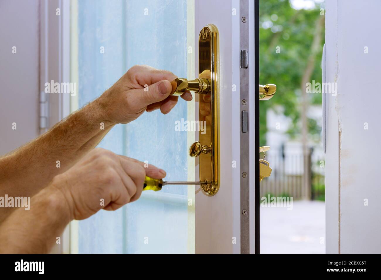 Handle installed on wood door lock systems security protection for apartment Stock Photo Alamy