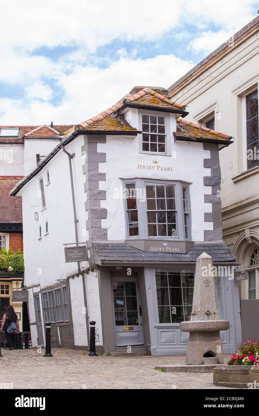 The Jersey Pearl pearl shop in Windsor England UK formerly called the  crooked house or the market cross house i Stock Photo - Alamy