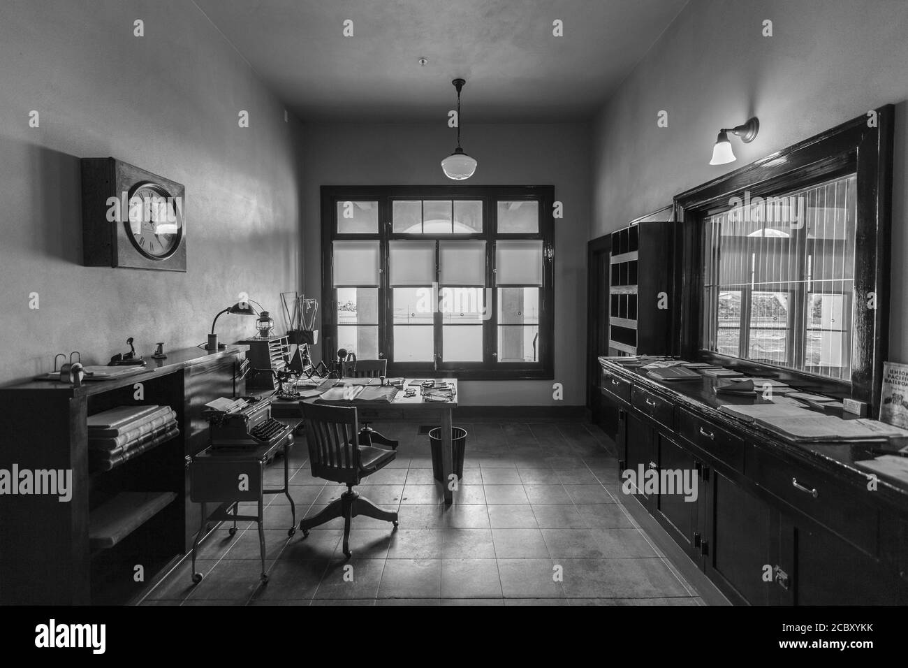 Black and white view inside the restored ticket office at the Kelso train station which now home to the Mojave National Preserve Park Visitor Center n Stock Photo