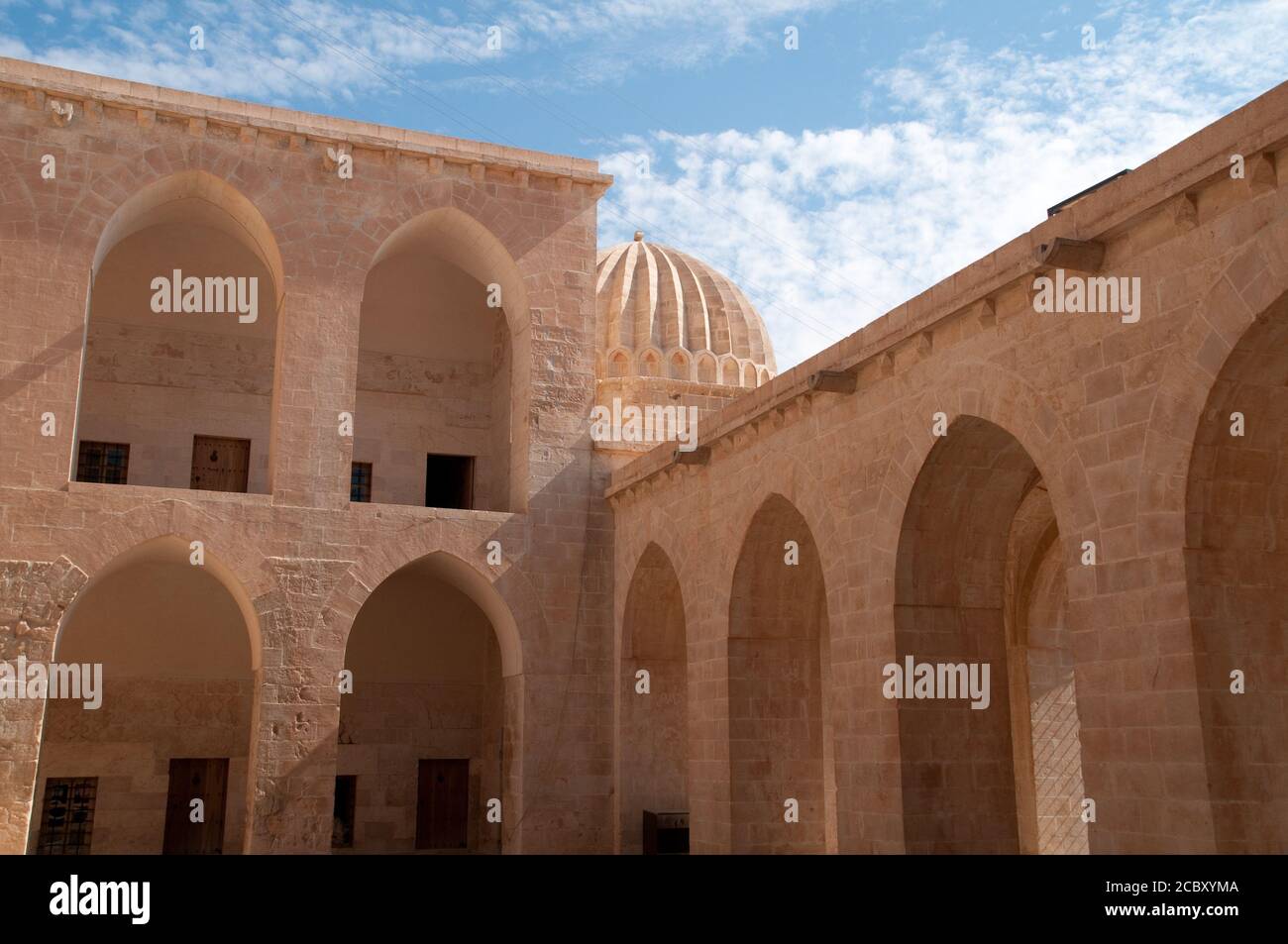 The courtyard of Kasimiye Medresesi, a medieval 15th century mosque and religious school in the of city Mardin, eastern Anatolia, Turkey. Stock Photo