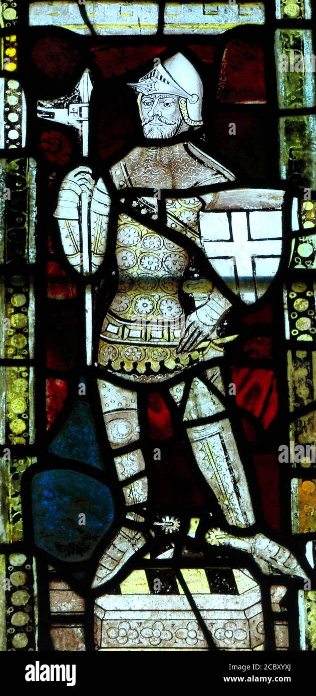 14th century, stained glass window, medieval knight, in armour, Castle Acre, Norfolk, England, UK Stock Photo