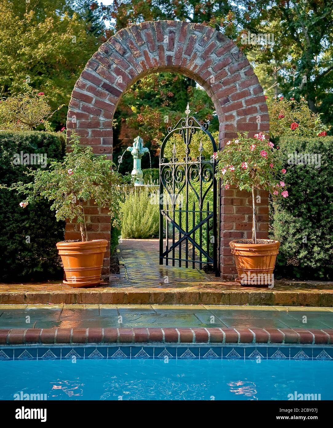 Brick arbor in garden Stock Photo