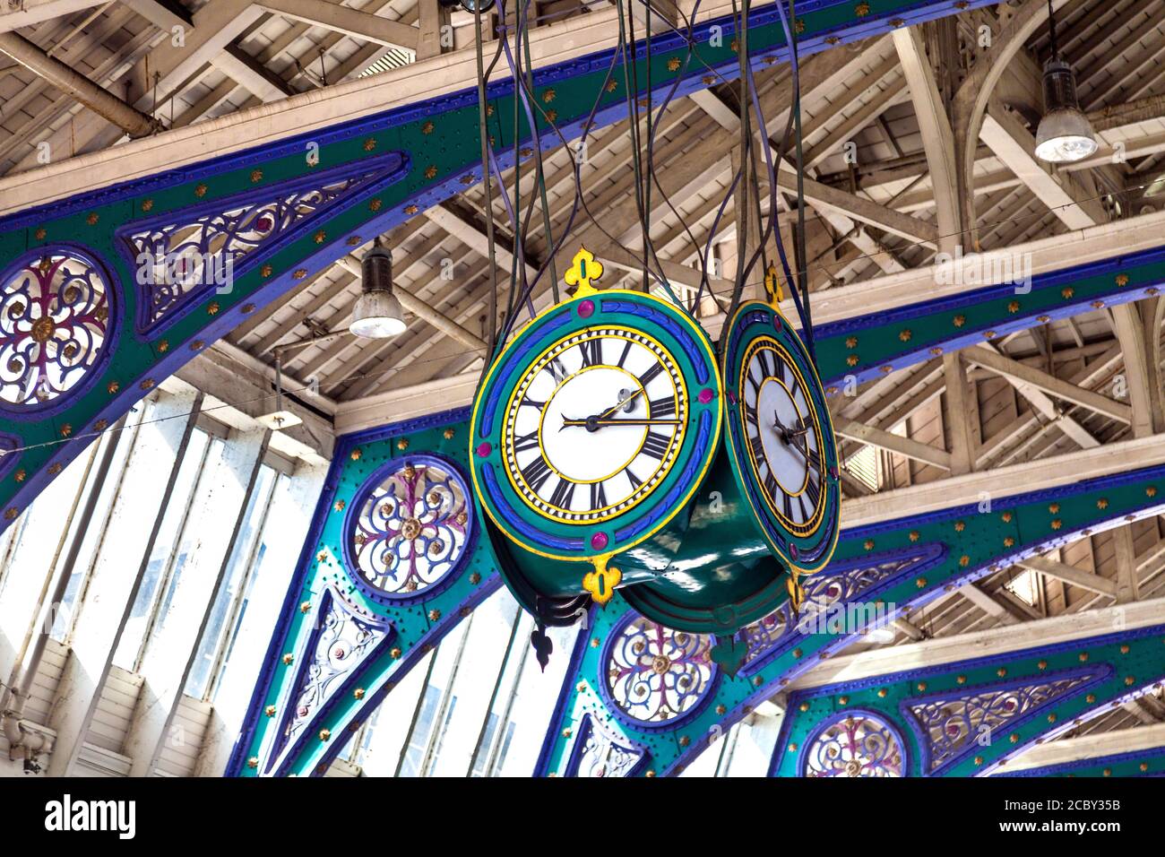 Clock and cast iron detail of Grand Avenue at historic cast iron Victorian meat market Smithfield Market, London, UK Stock Photo
