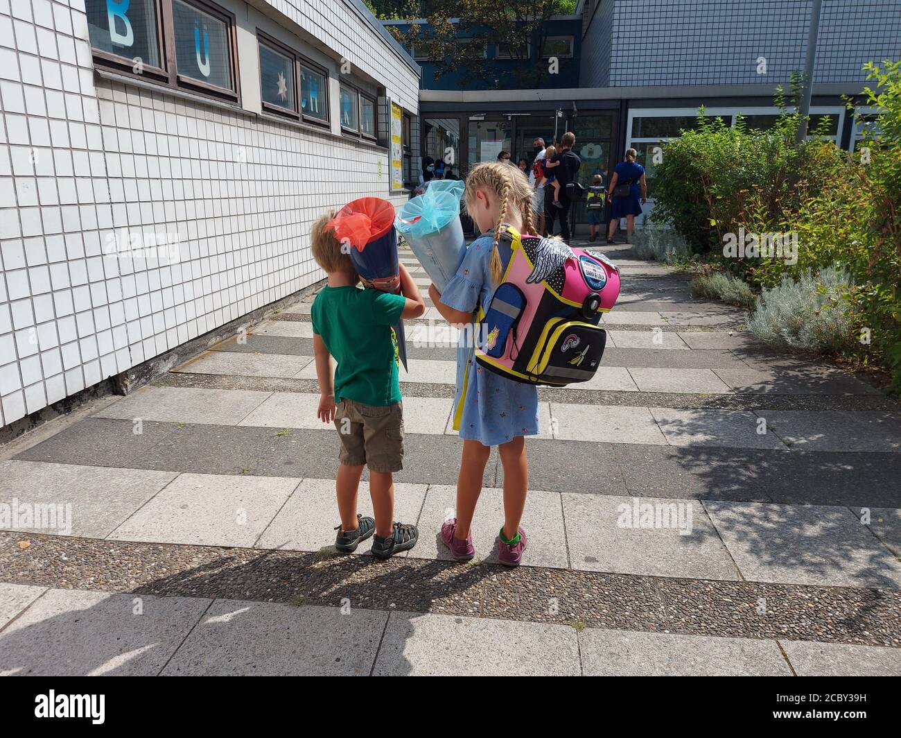 Berlin, Germany. 15th Aug, 2020. First graders carrying candy cones 'Zueckertuete' go for the first time to the Elementary School in Berlin, Germany, August 15, 2020. Credit: Ales Zapotocky/CTK Photo/Alamy Live News Stock Photo
