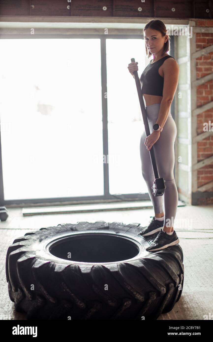 Woman sledge construction hires stock photography and images Alamy