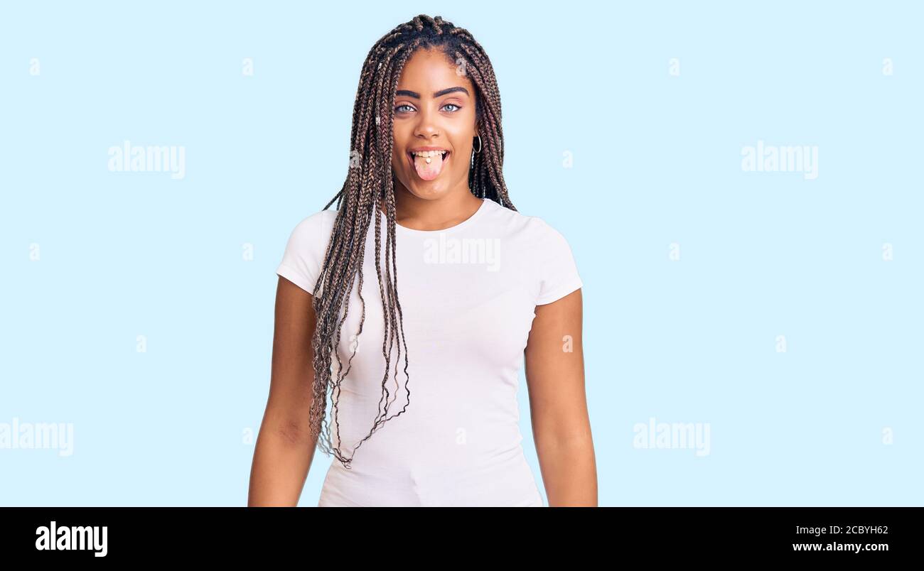 Young african american woman with braids wearing casual summer