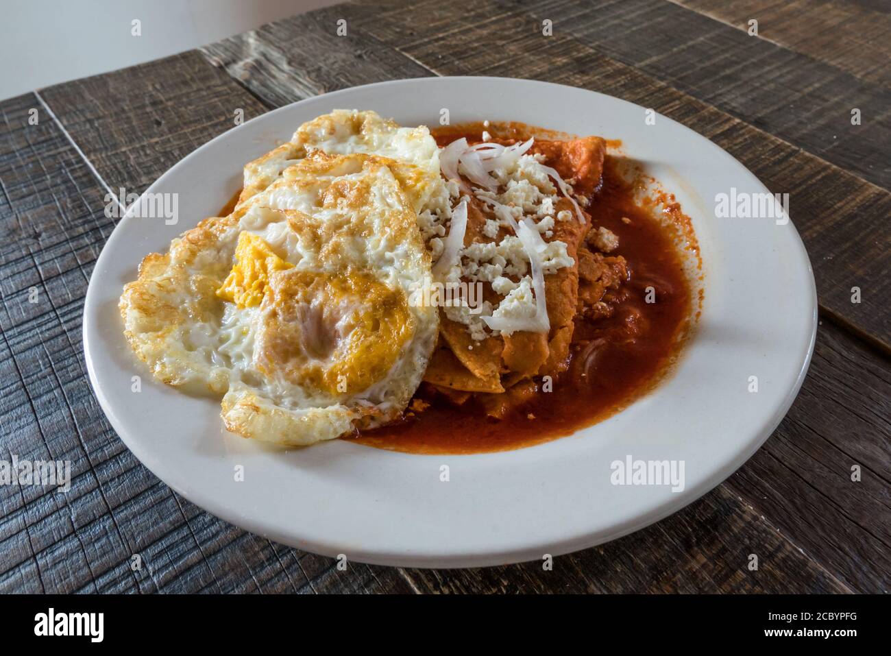 Enfrijoladas, a typical Oaxacan breakfast, with fried eggs, tortillas