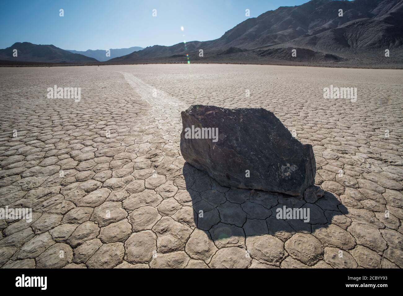 The famous sailing stones of the racetrack in Death Valley National Park, California. For a long time it was a mystery how they moved and left trails. Stock Photo