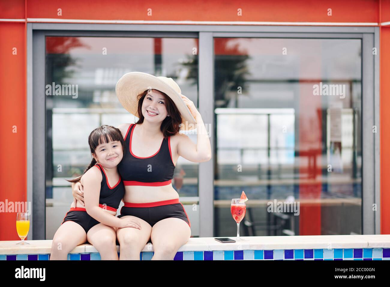 Mother and daughter in swimsuits Stock Photo