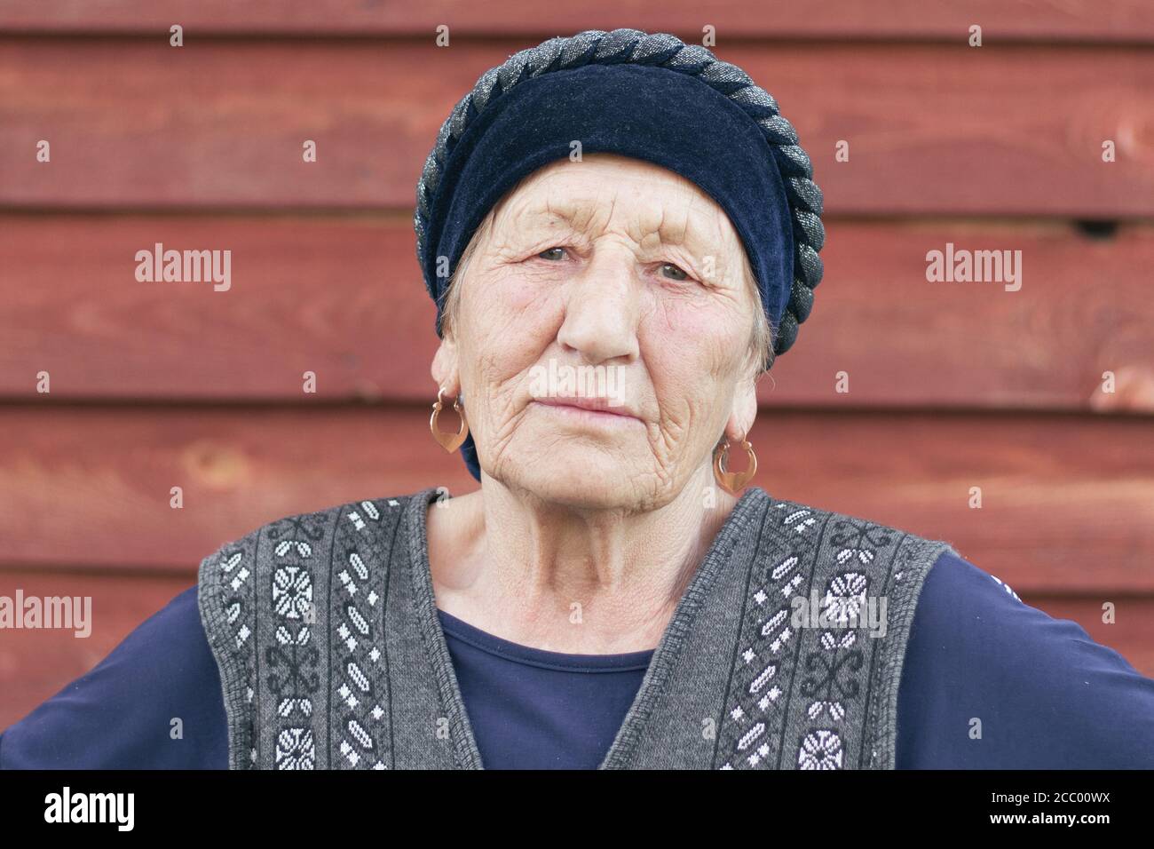 Close up portrait of a muslim senior woman in a traditional clothes