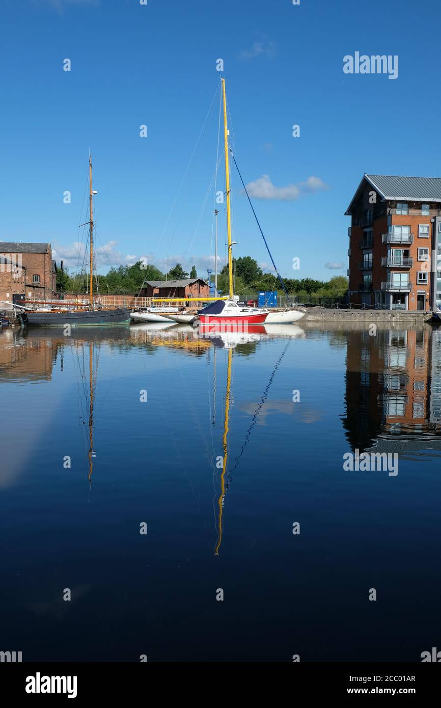 Boats moored in the main basin of Gloucester Docks on the Gloucester and Sharpness Canal in south-west England Stock Photo