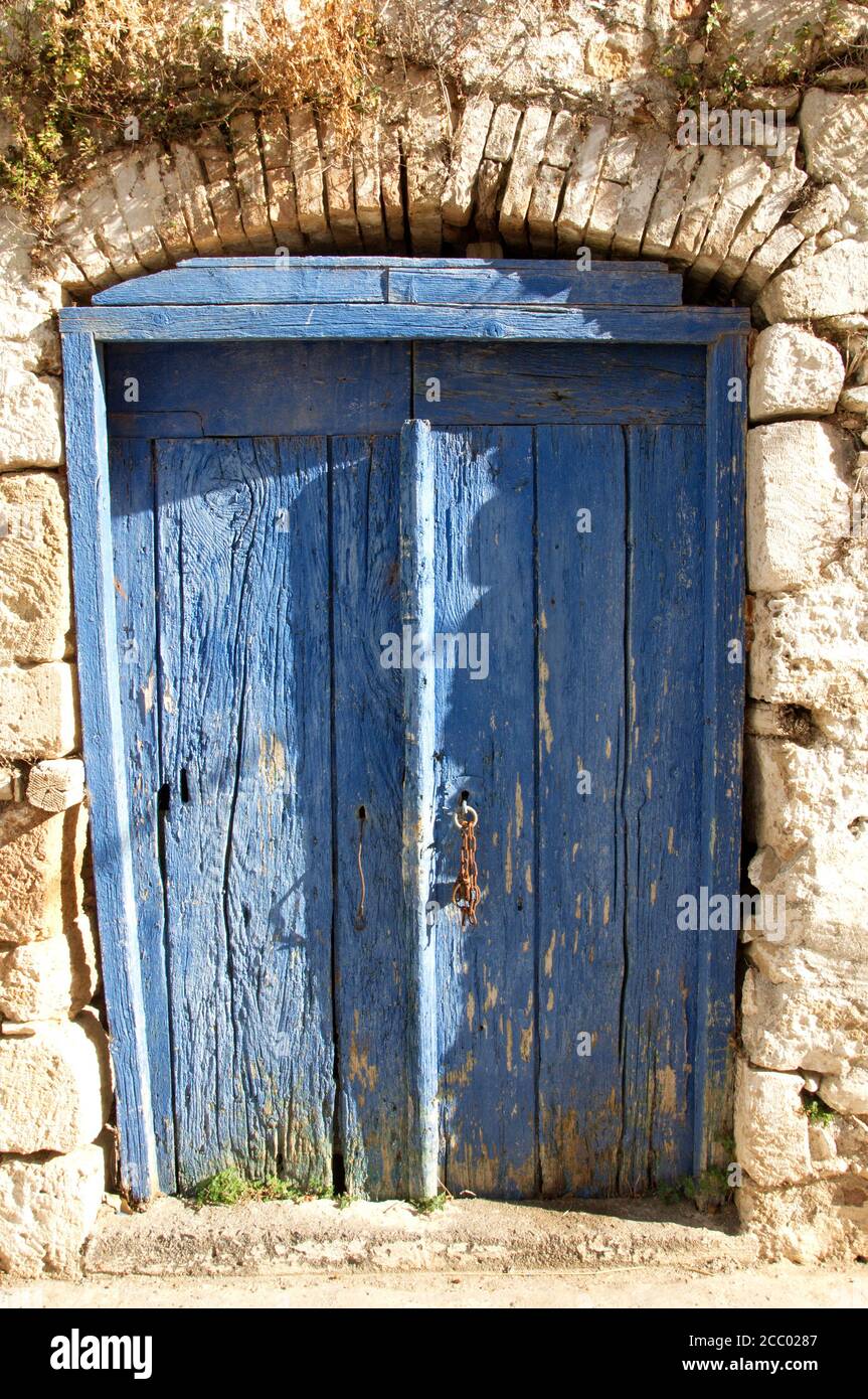 Colorful blue door of a Greek village house Stock Photo - Alamy