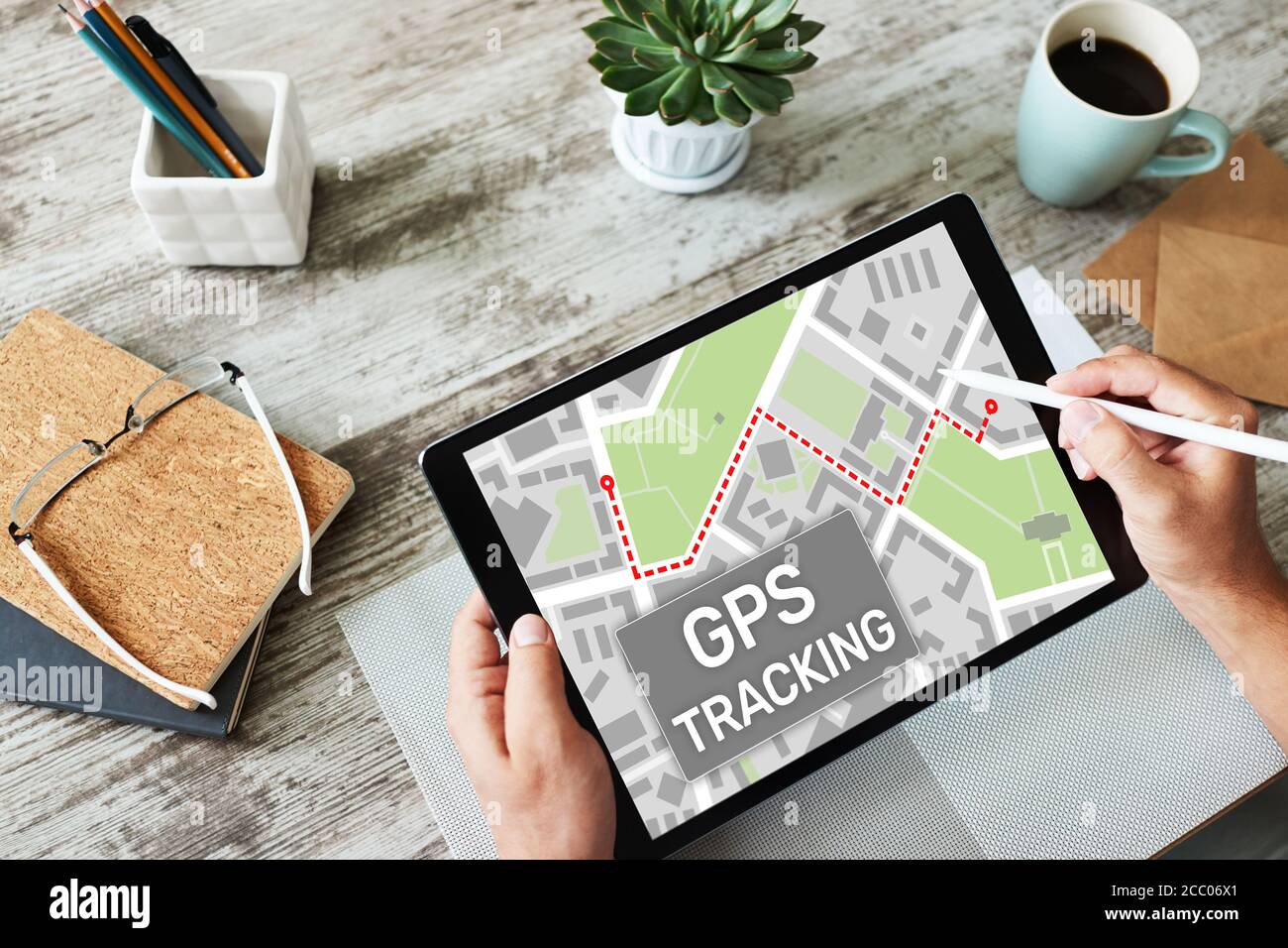 GPS Global positioning system tracking map on device screen Stock Photo ...