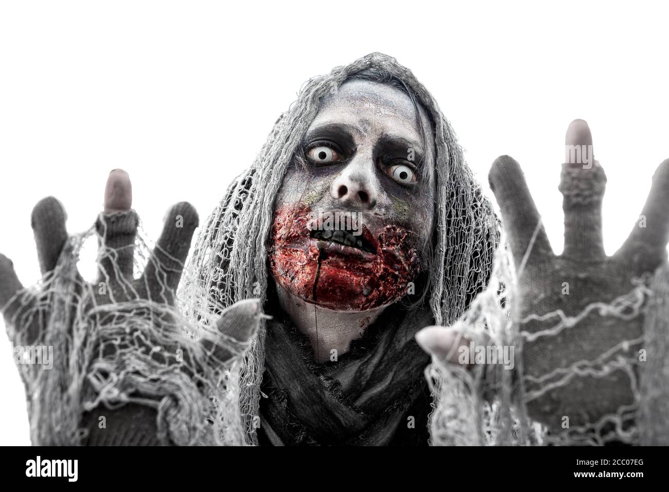 Spooky dead bride or ghost with bloody make up, female halloween costume, cutout Stock Photo
