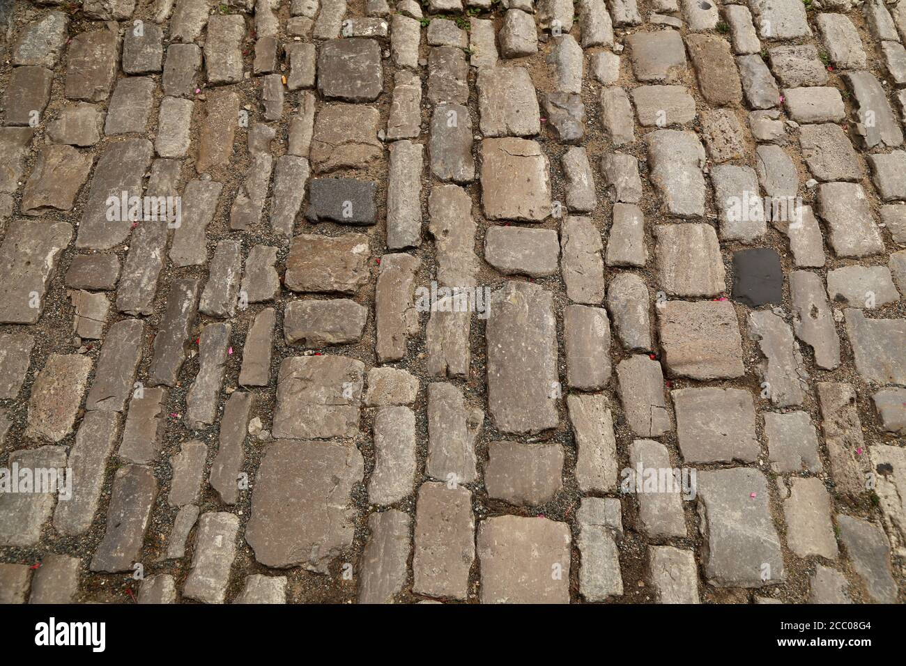 Abstract background of old cobblestone pavement close-up Stock Photo ...
