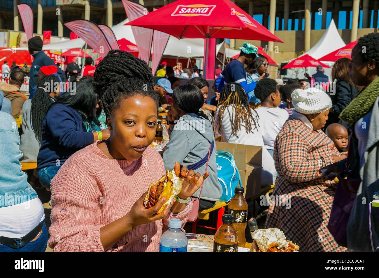 Soweto, South Africa - September 8, 2018: Diverse African people at a bread based street food outdoor festival Stock Photo