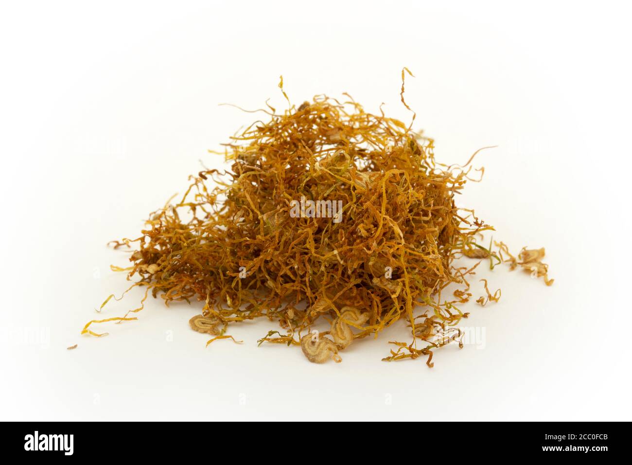 dried tobacco leaves on a white background Stock Photo - Alamy