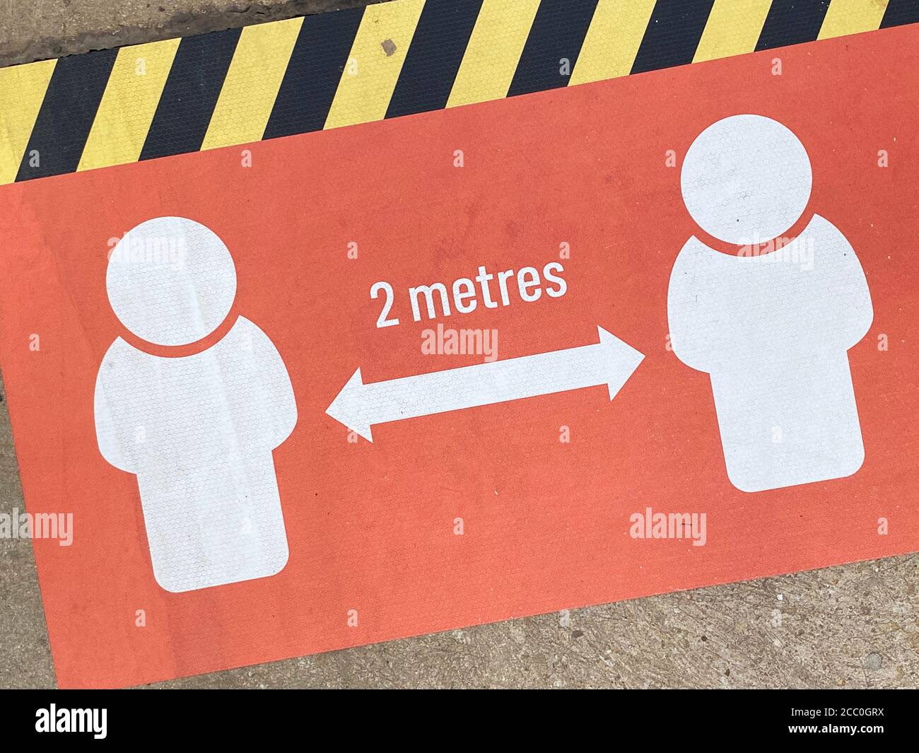 Social distance message to stay 2 metres apart during coronavirus Stock Photo
