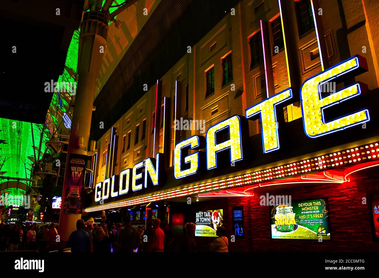 Golden Gate Hotel & Casino sign illuminated by night in Las Vegas. It
