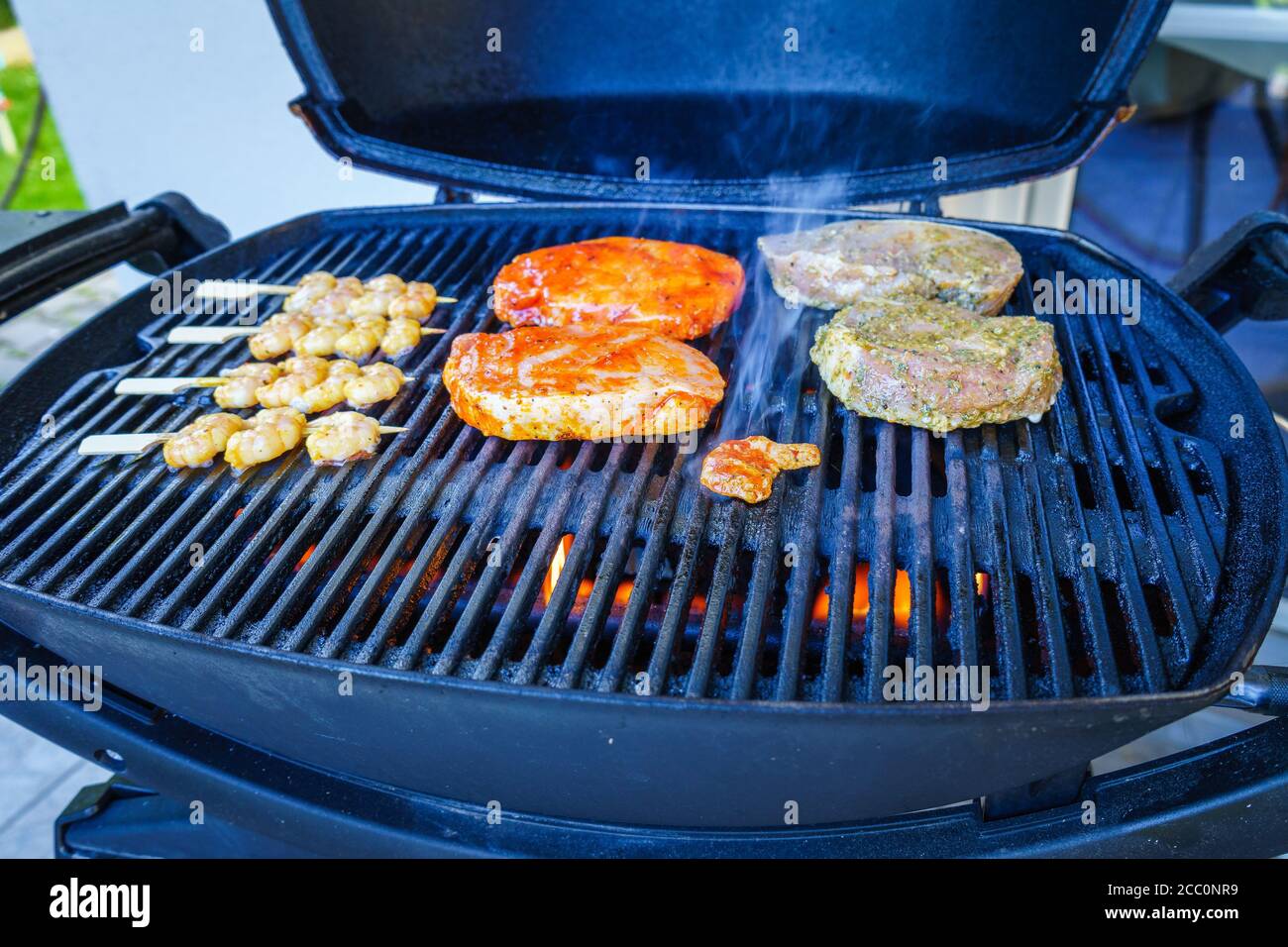 Grilling Steaks on a Gas Grill in Lower Bavaria Germany Stock Photo Alamy