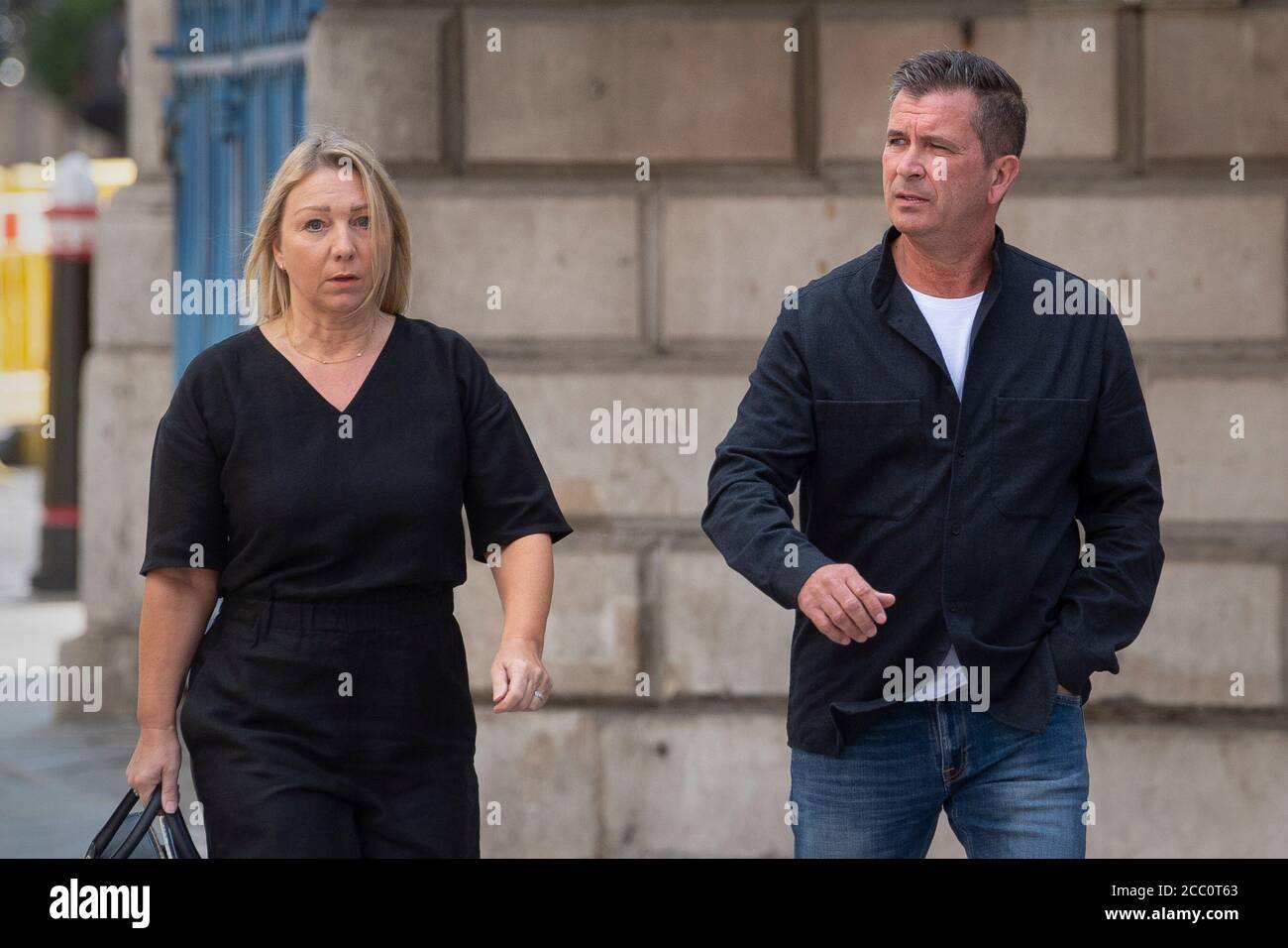 Rikki Nicholls, 55, and Sharon Nicholls, 56, arrive at the City of London Magistrates' Court charged over an alleged ??22m pension fraud, in a case which is claimed to involve 275 victims. Stock Photo