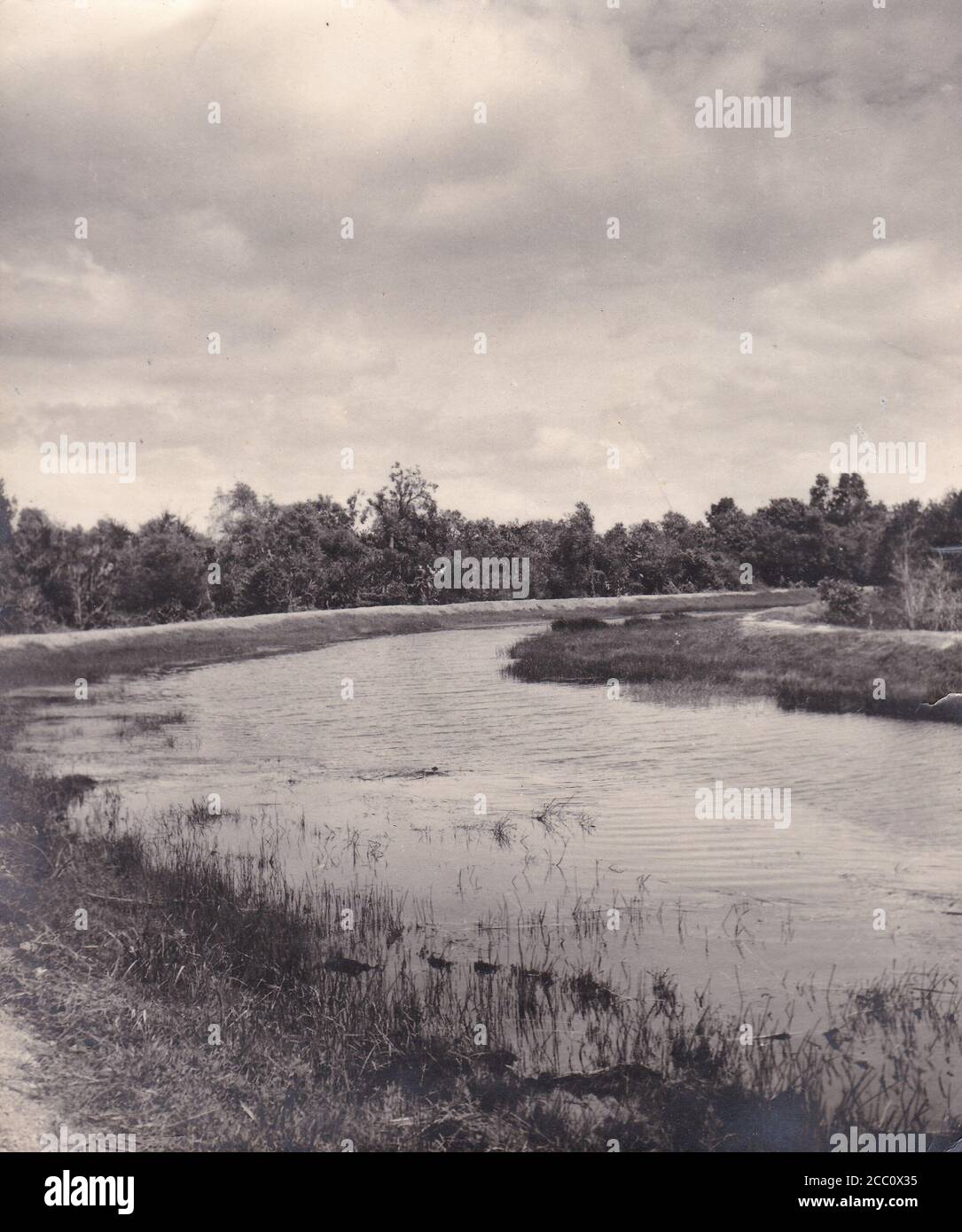 Vintage black and white photo of river and countryside 1930s Stock Photo