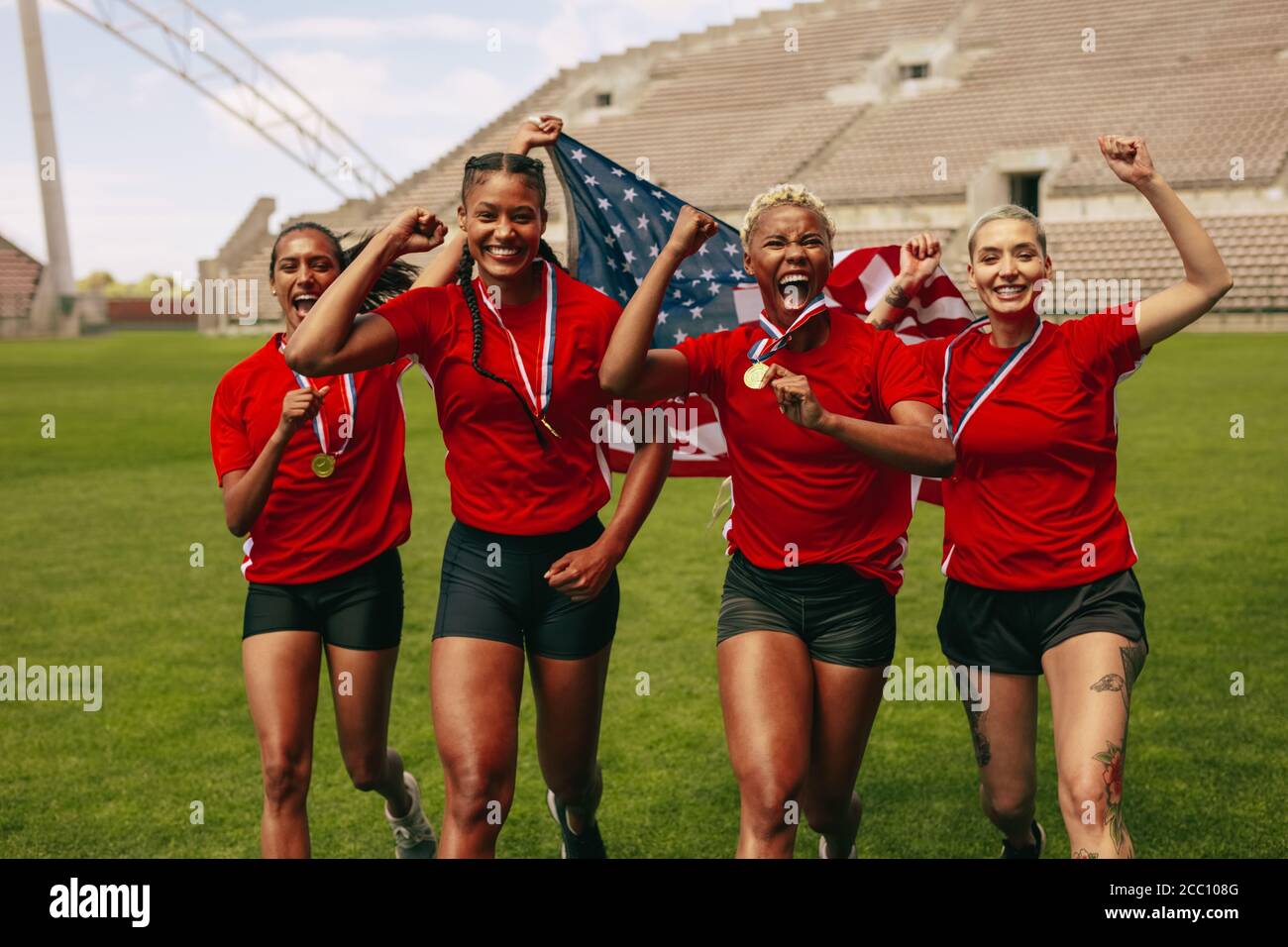 Female Soccer Players Running On Field Shouting In Joy After Winning The Championship American Female Football Team Celebrating Championship Screami Stock Photo Alamy