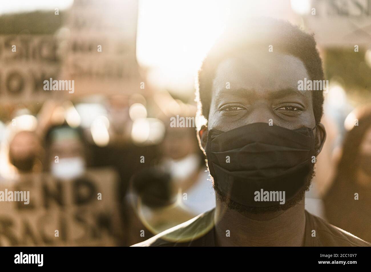 Human Rights Mask Young black man wearing face mask during equal rights protest - Concept ...