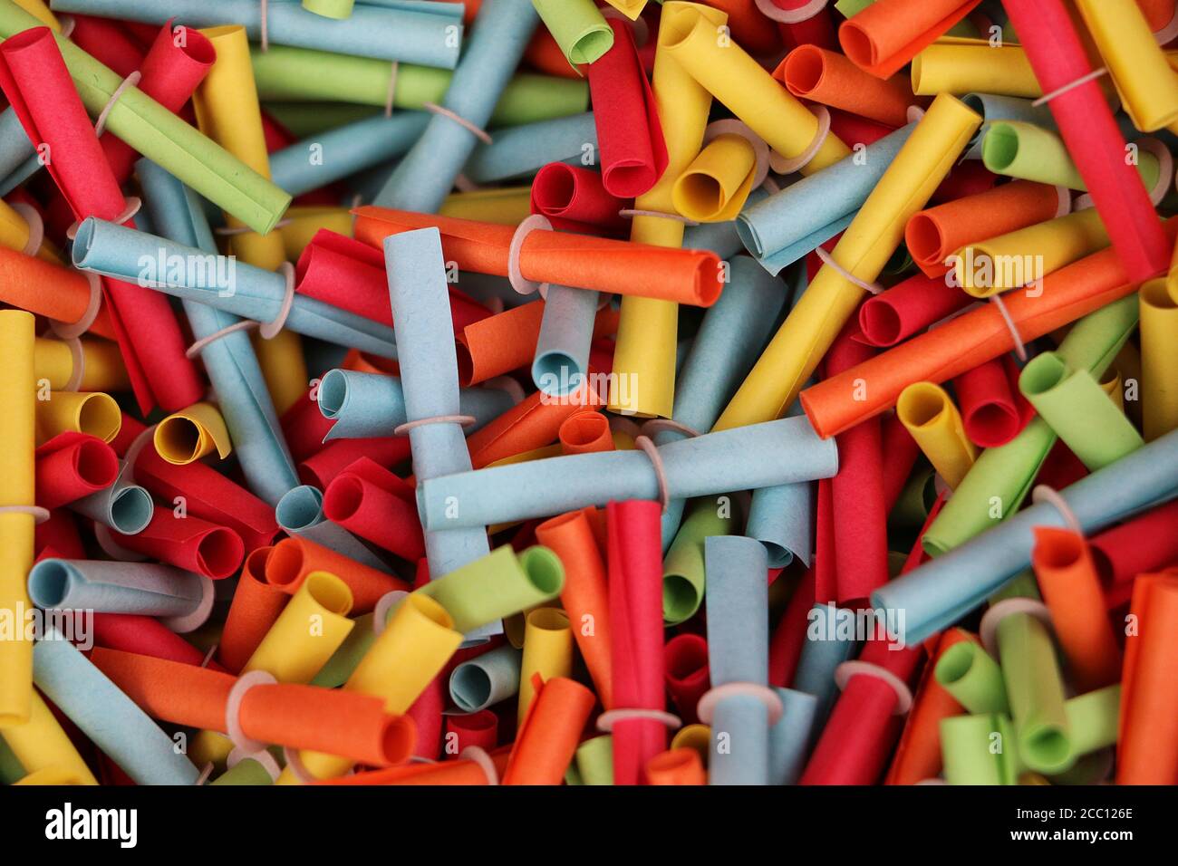 Closeup of a heap of colorful tombola tickets as a background Stock Photo