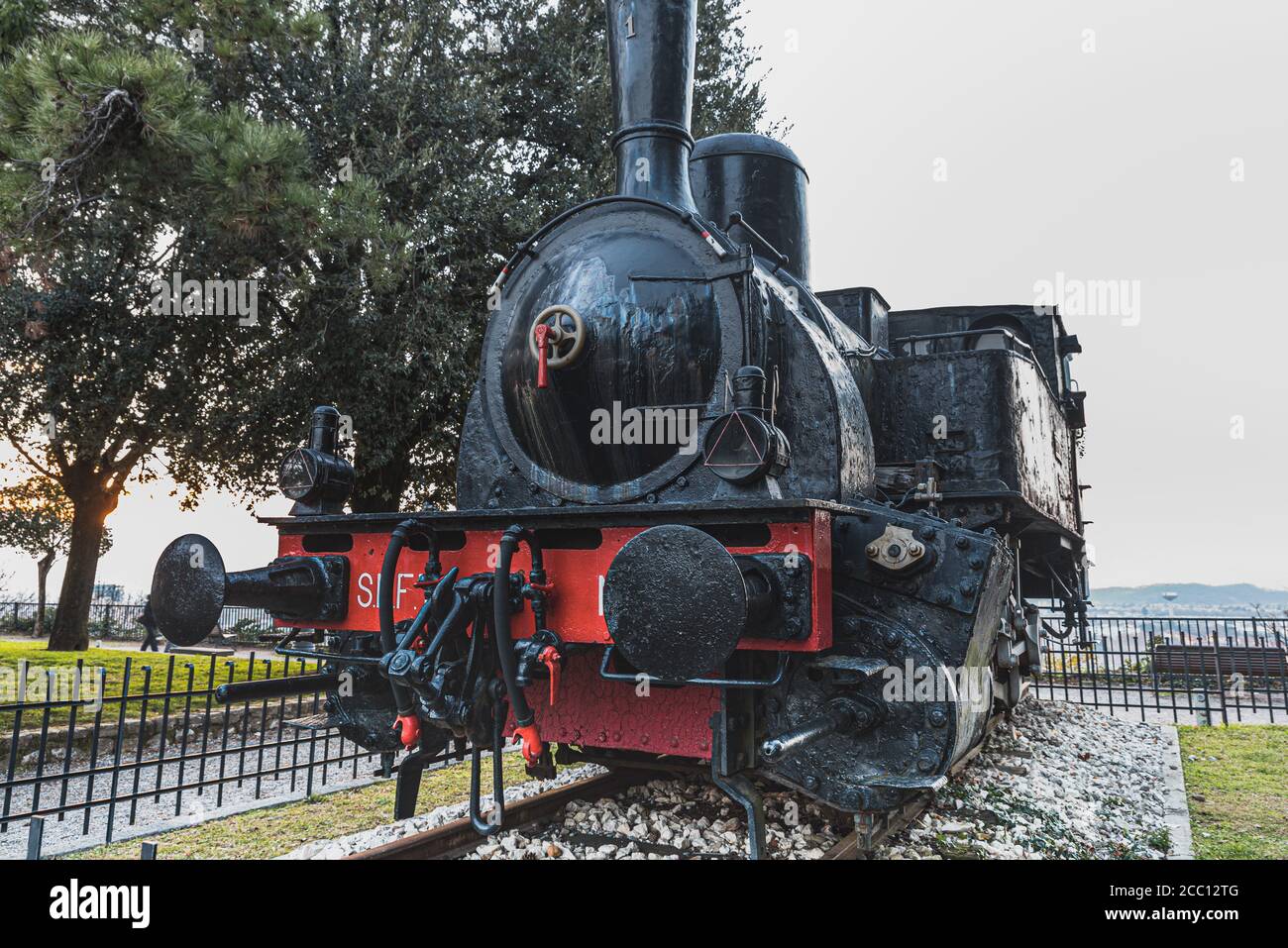 Historical Locomotive Number 1 (Locomotiva Numero Uno) is the first Italian engine used as a monument. It sits on the Colle Cidneo - Brescia, Italy Stock Photo