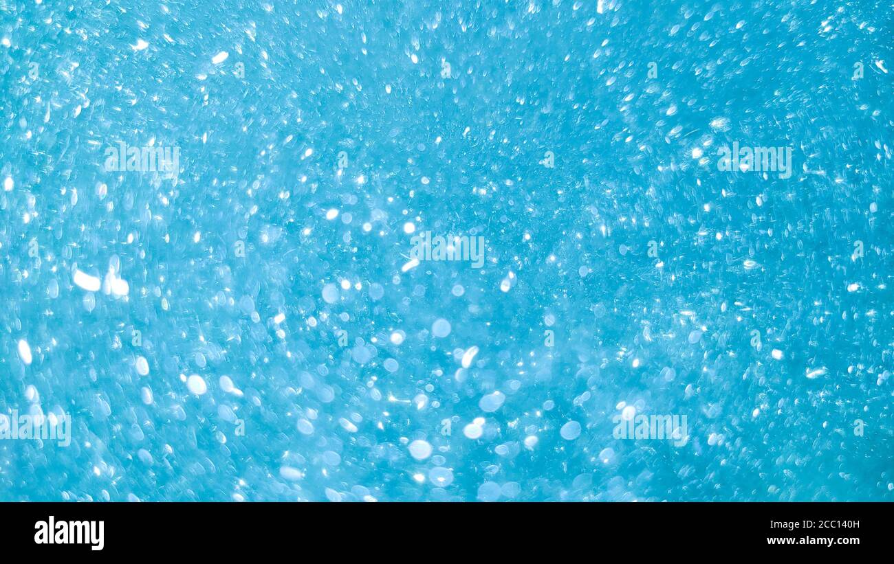 Abstract background blue bokeh circles and dots texture Stock Photo - Alamy