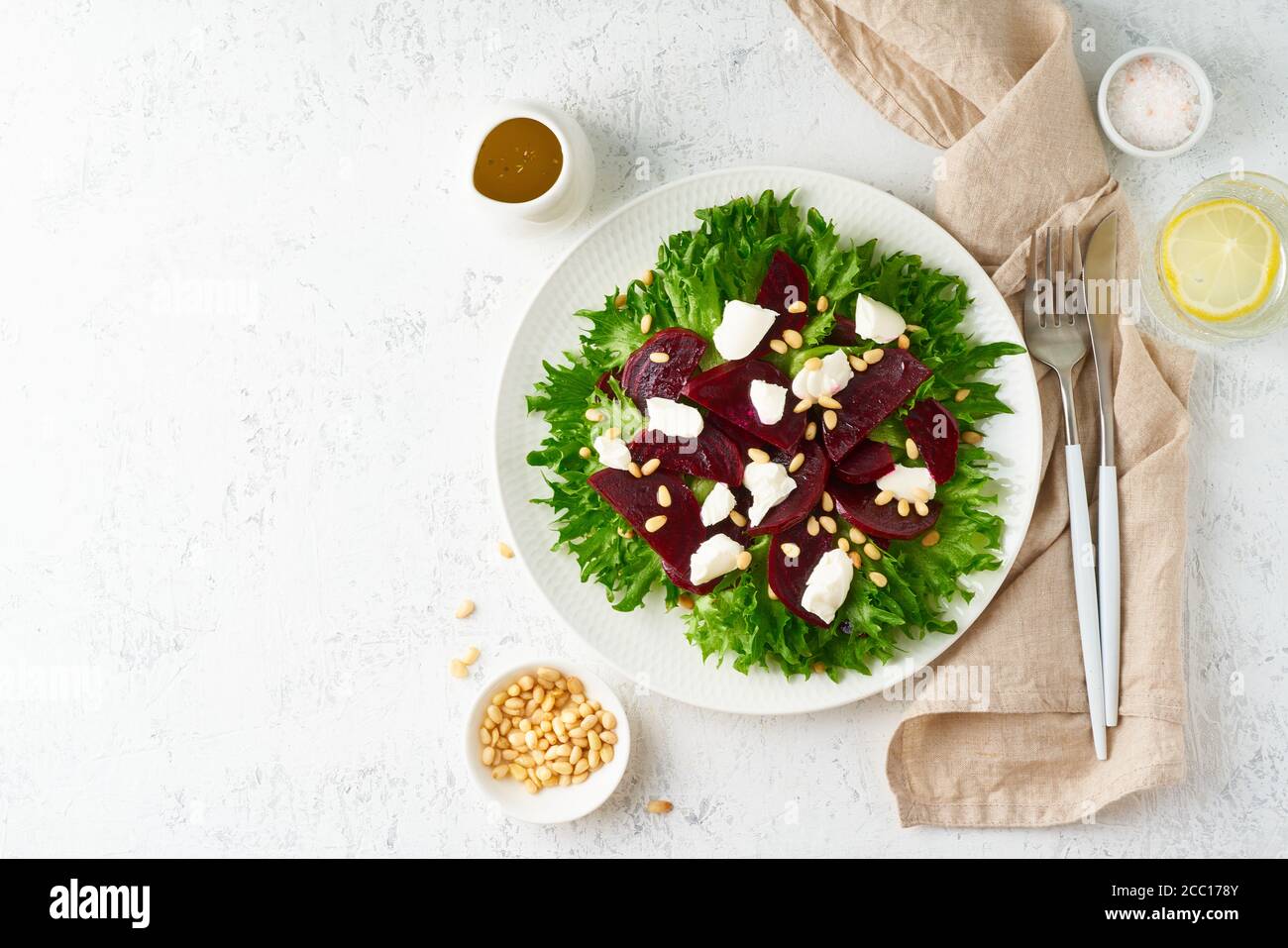salad with beet, curd, feta, ricotta and pine nuts, lettuce. Healthy