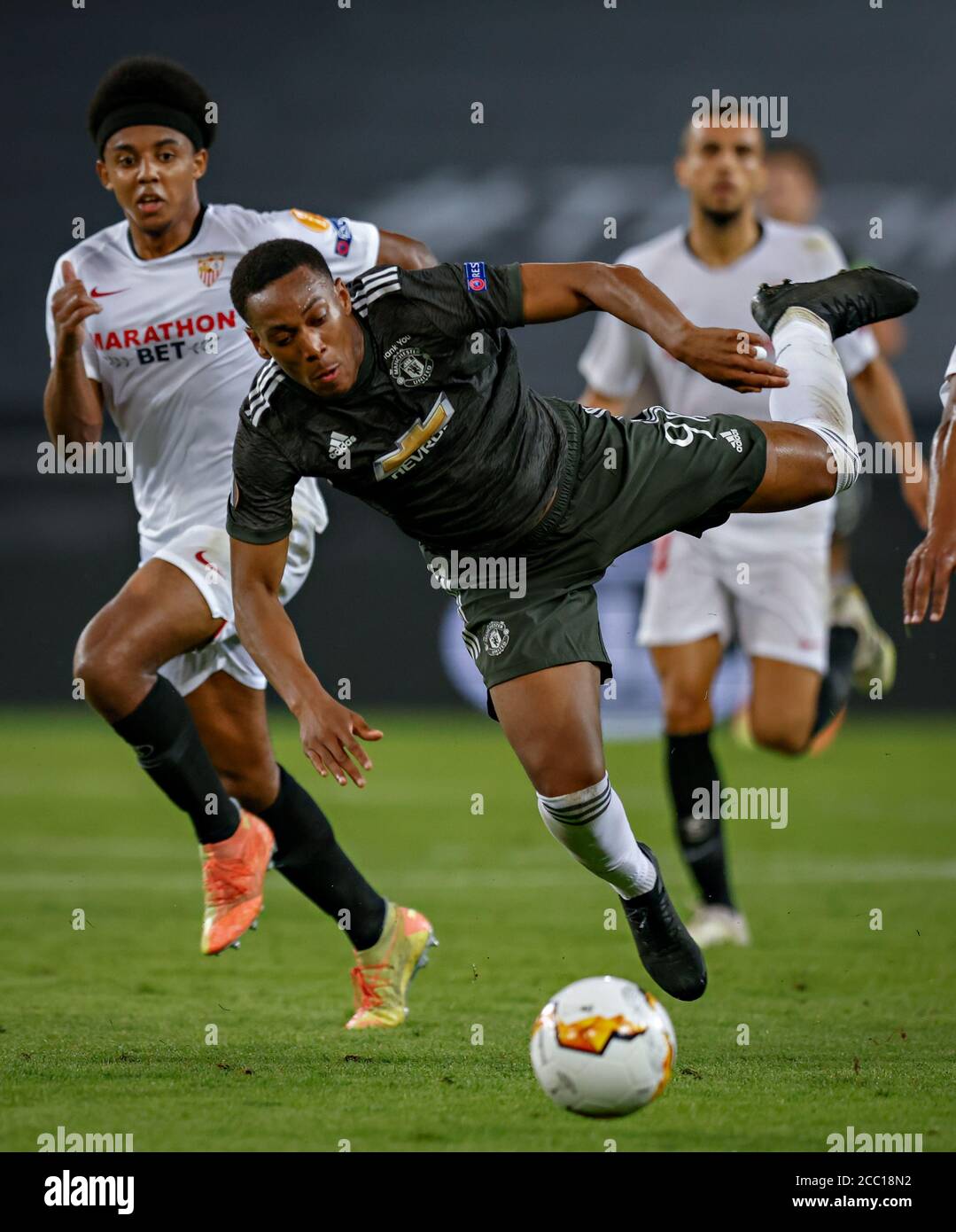 Köln, Koeln, Cologne, Germany, 16th August 2020.  Anthony Martial (ManU), Jules Kounde (Sevilla) in the semifinal UEFA Europa League match final tourn Stock Photo