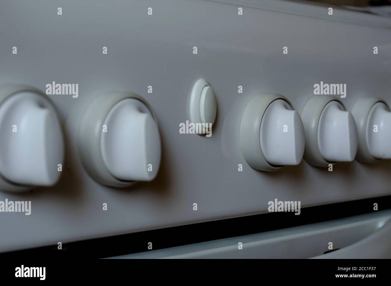 Close up White dirty knobs with drops of fat. Knob dial of control